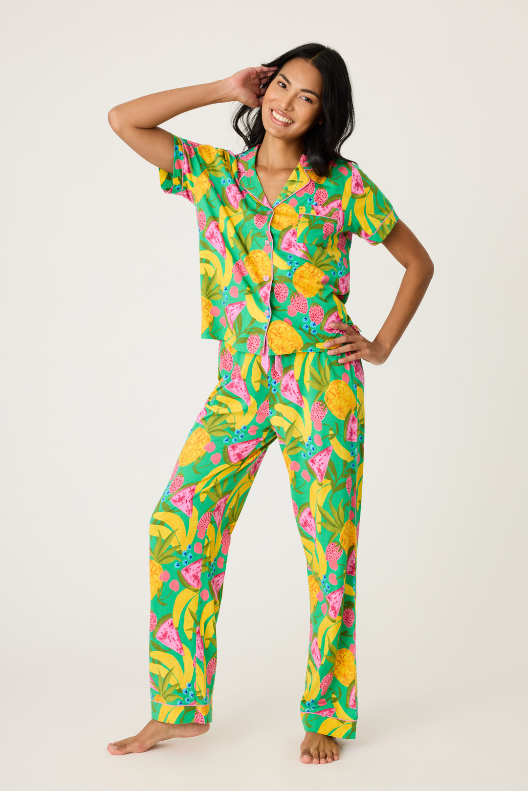 Women's breathable cotton-modal jersey short sleeve pajama set in multicolor fruit print with contrast pink piping. Button-front top & open leg tie-waist pant.