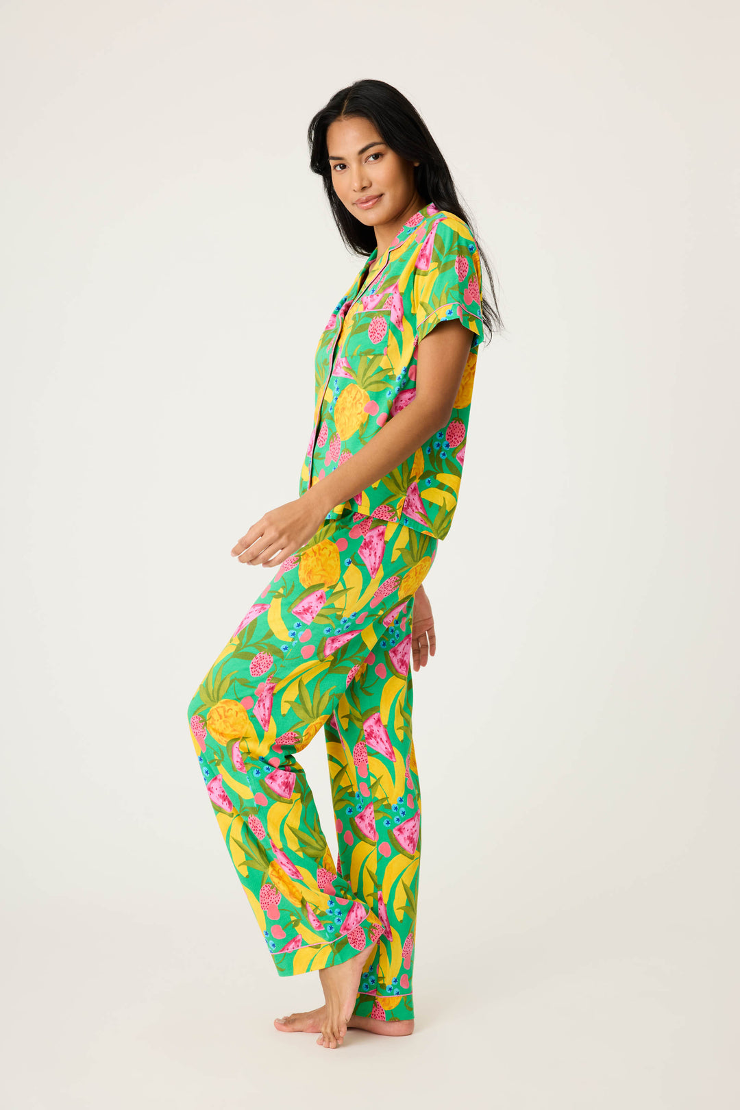 Women's breathable cotton-modal jersey short sleeve pajama set in multicolor fruit print with contrast pink piping. Button-front top & open leg tie-waist pant.