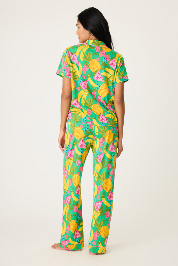 Women's breathable cotton-modal jersey short sleeve pajama set in multicolor fruit print with contrast pink piping. Button-front top & open leg tie-waist pant.