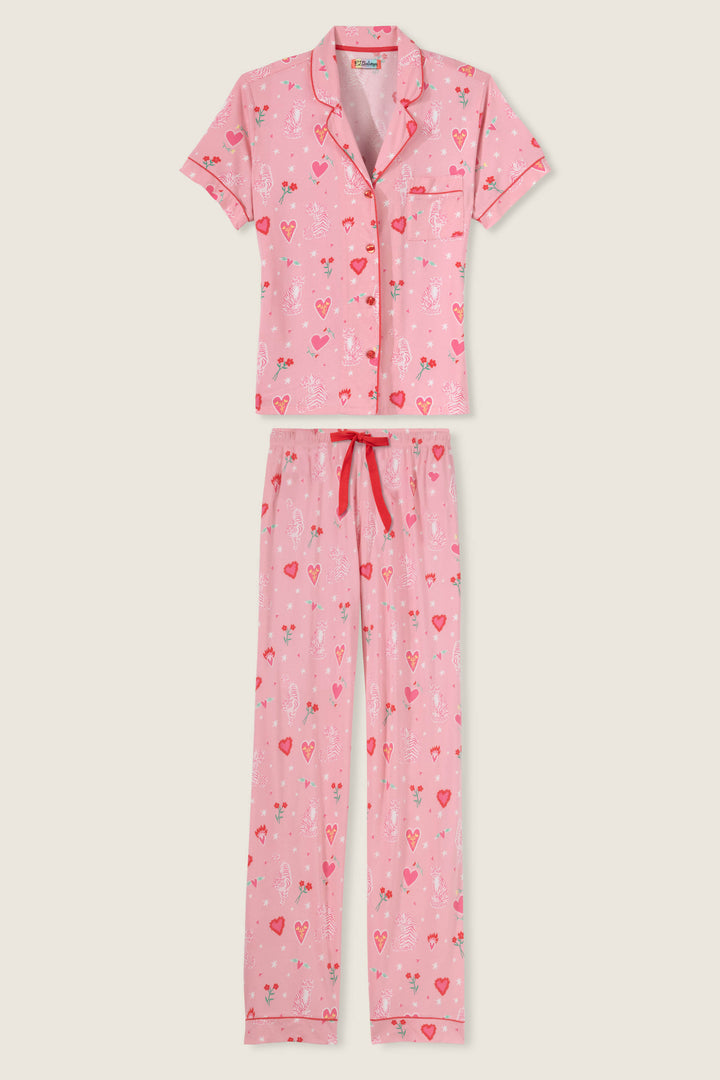 Women's breathable cotton-modal jersey short sleeve pajama set in pink mini tiger & heart print with contrast red piping. Button-front top & open leg tie-waist pant.