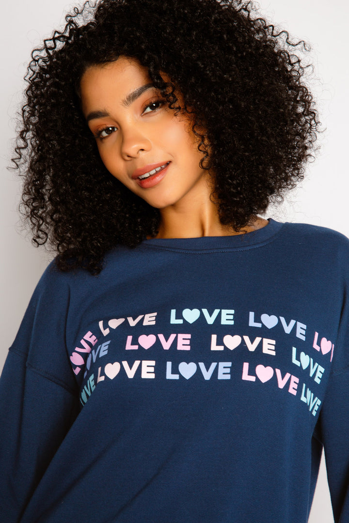 Navy high-pile fleece pullover top with LOVE letter repeat print on chest. (7325667688548)