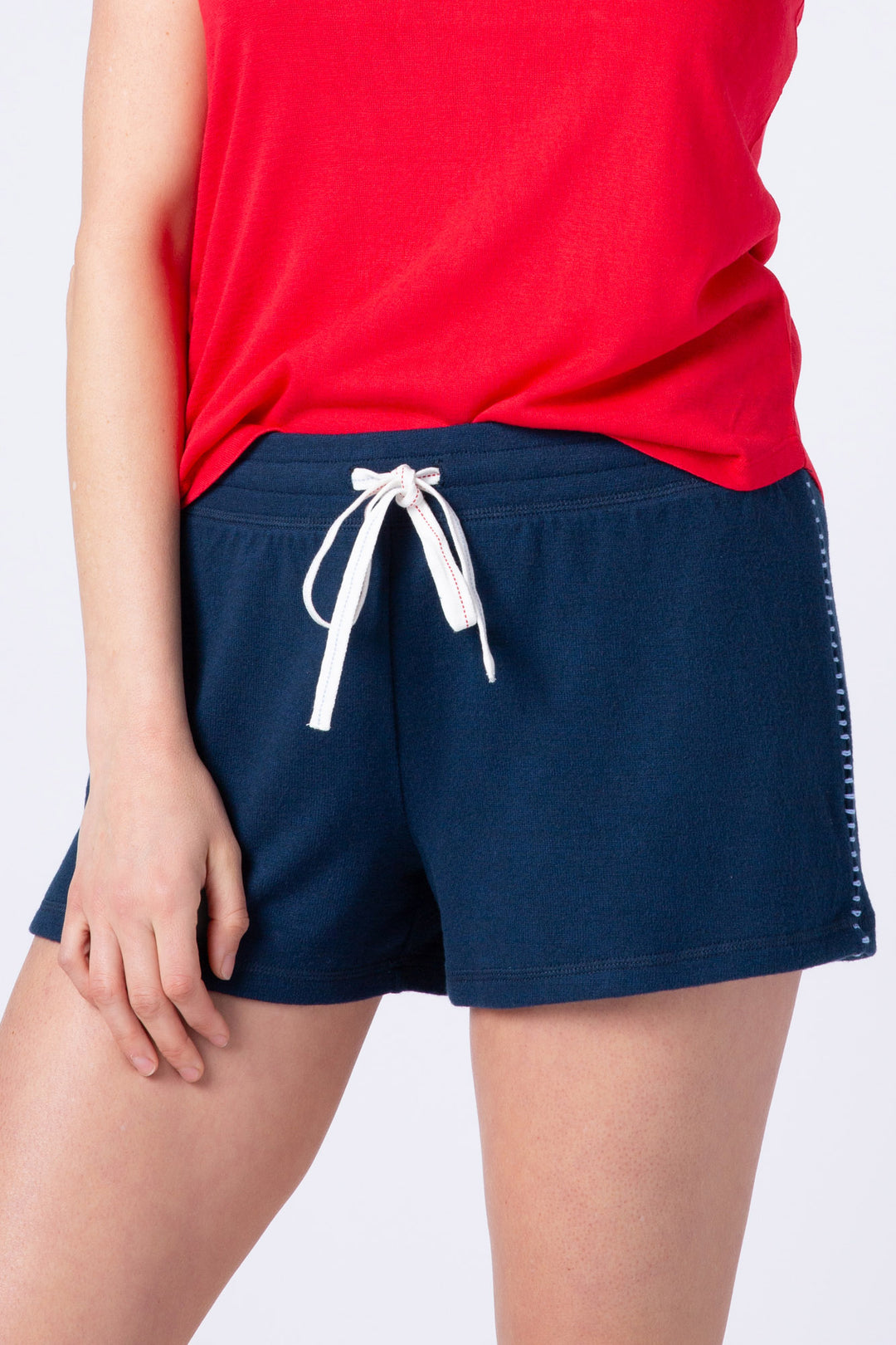 Women's navy blue lounge short w/white & red whipstitching & tie waist.