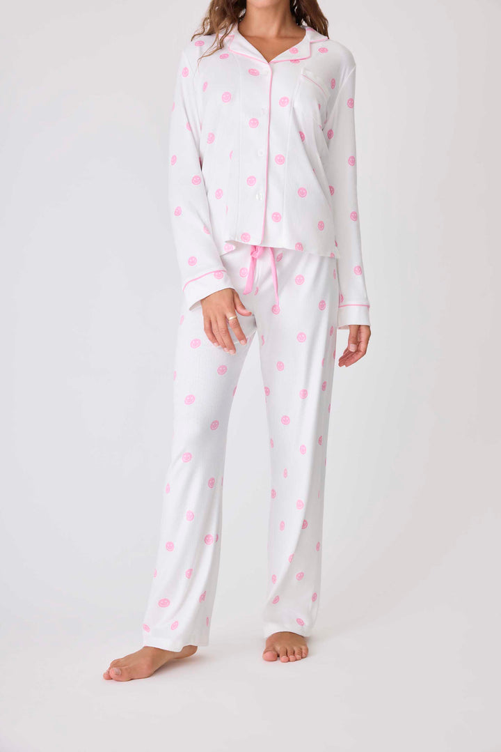 Women's ivory pajama pant with pink happy face pattern. Exclusive PJS x Susan G Komen style.