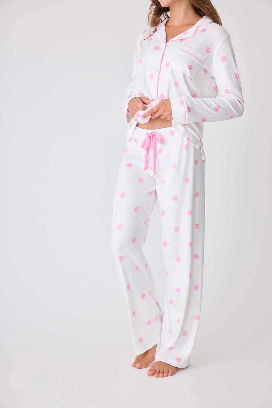 Women's ivory pajama pant with pink happy face pattern. Exclusive PJS x Susan G Komen style.