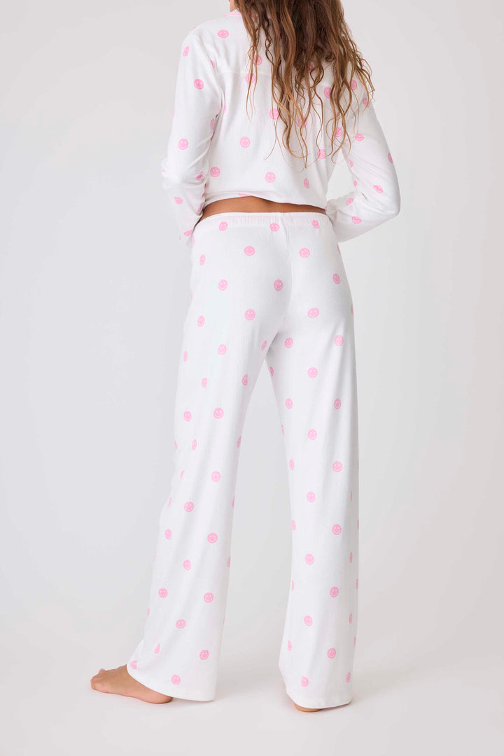 Women's ivory pajama pant with pink happy face pattern. Exclusive PJS x Susan G Komen style.