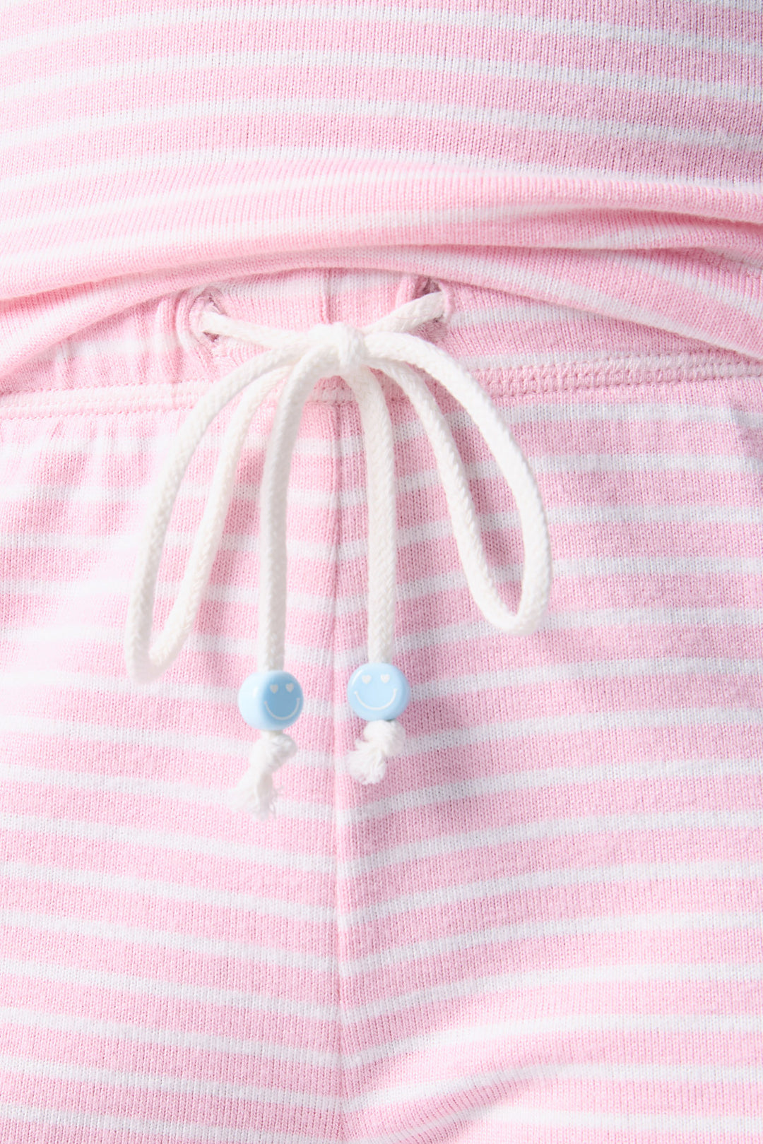 Women's pajama short in pink-ivory mini stripe, with contrast tipped drawcord.