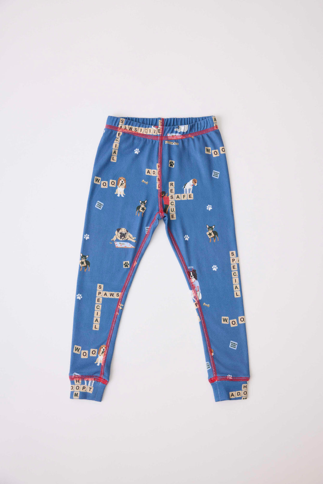 Kids two-piece pj set in gender-netural blue with dog-game print. Exclusive style to support partnership with Love Leo Rescue.