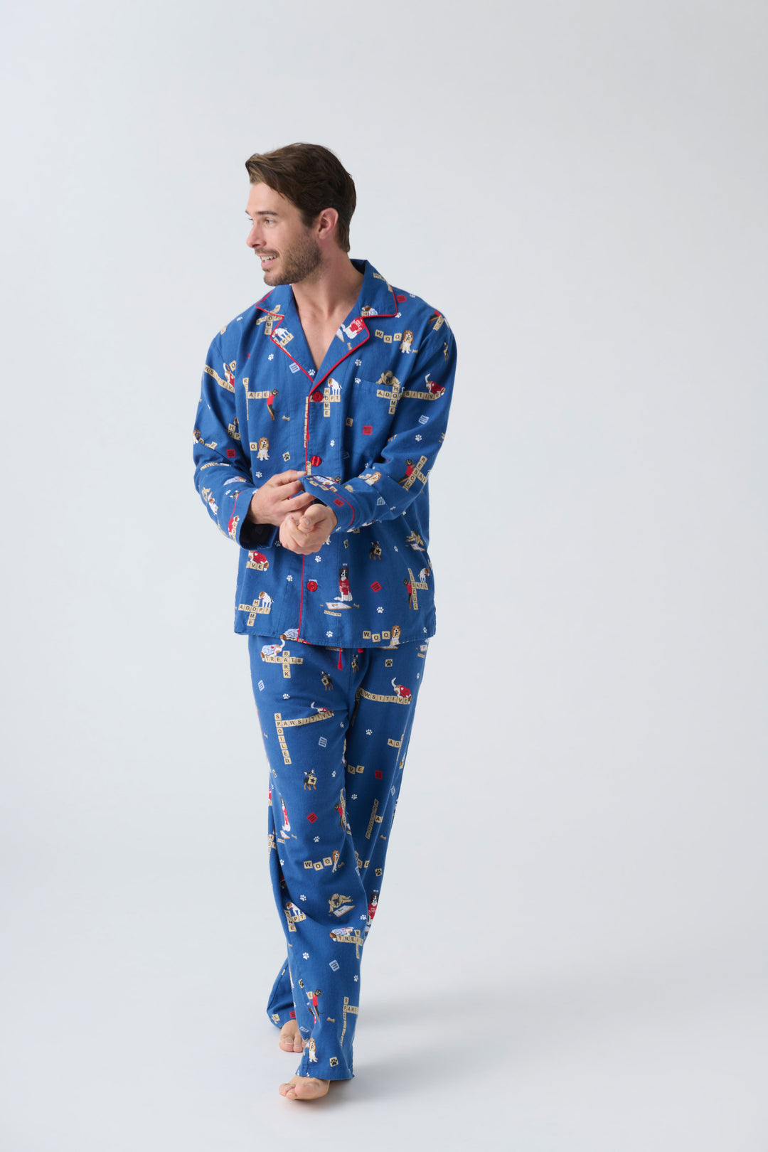 Men's cotton flannel pajama set in dark blue with dog-game print. Exclusive style to support partnership with Love Leo Rescue.