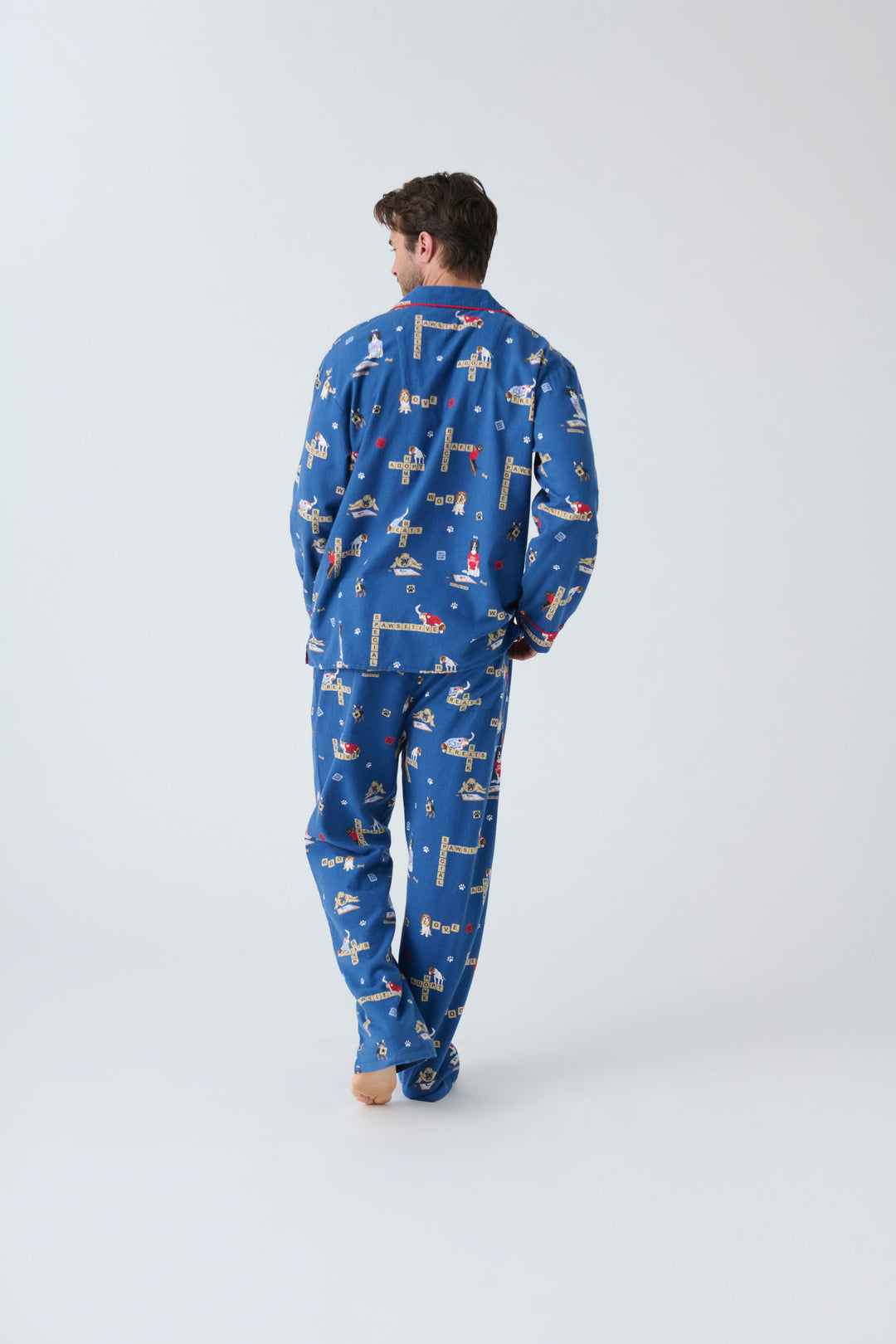 Men's cotton flannel pajama set in dark blue with dog-game print. Exclusive style to support partnership with Love Leo Rescue.