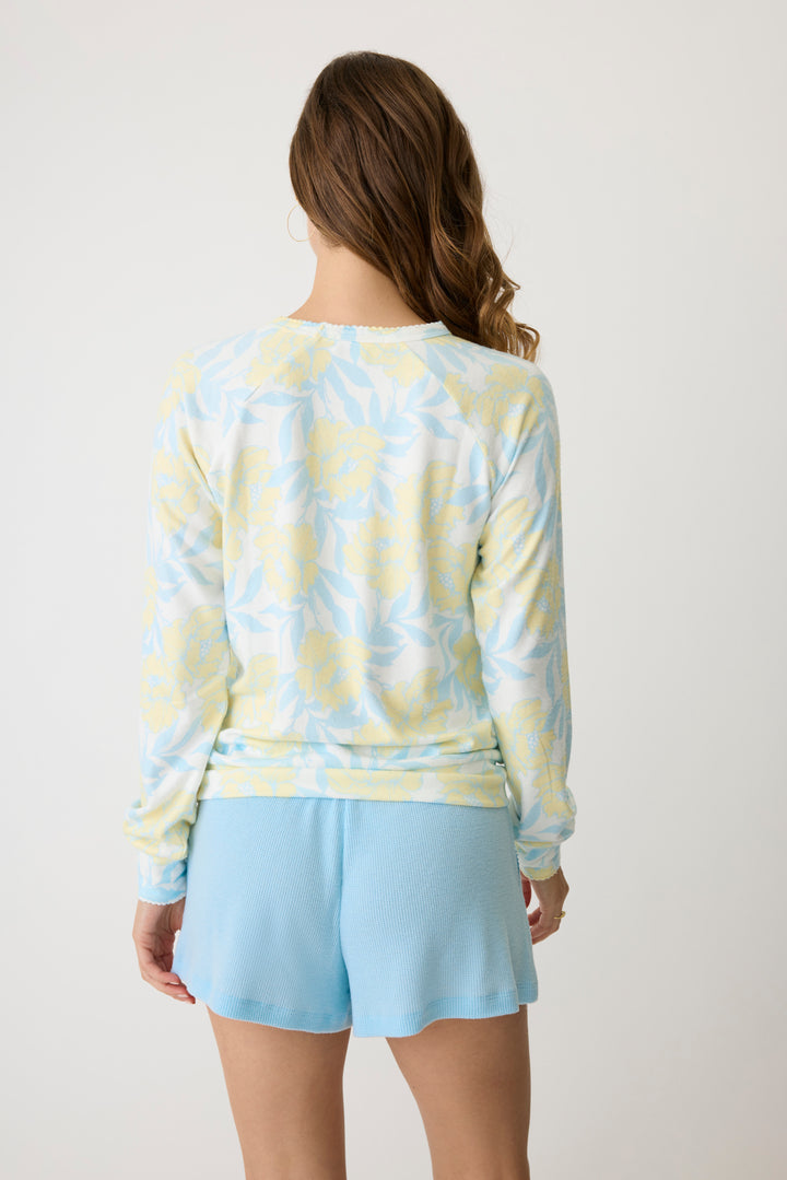 Women's short in light blue baby waffle knit with side pockets & multi-twist drawcord.