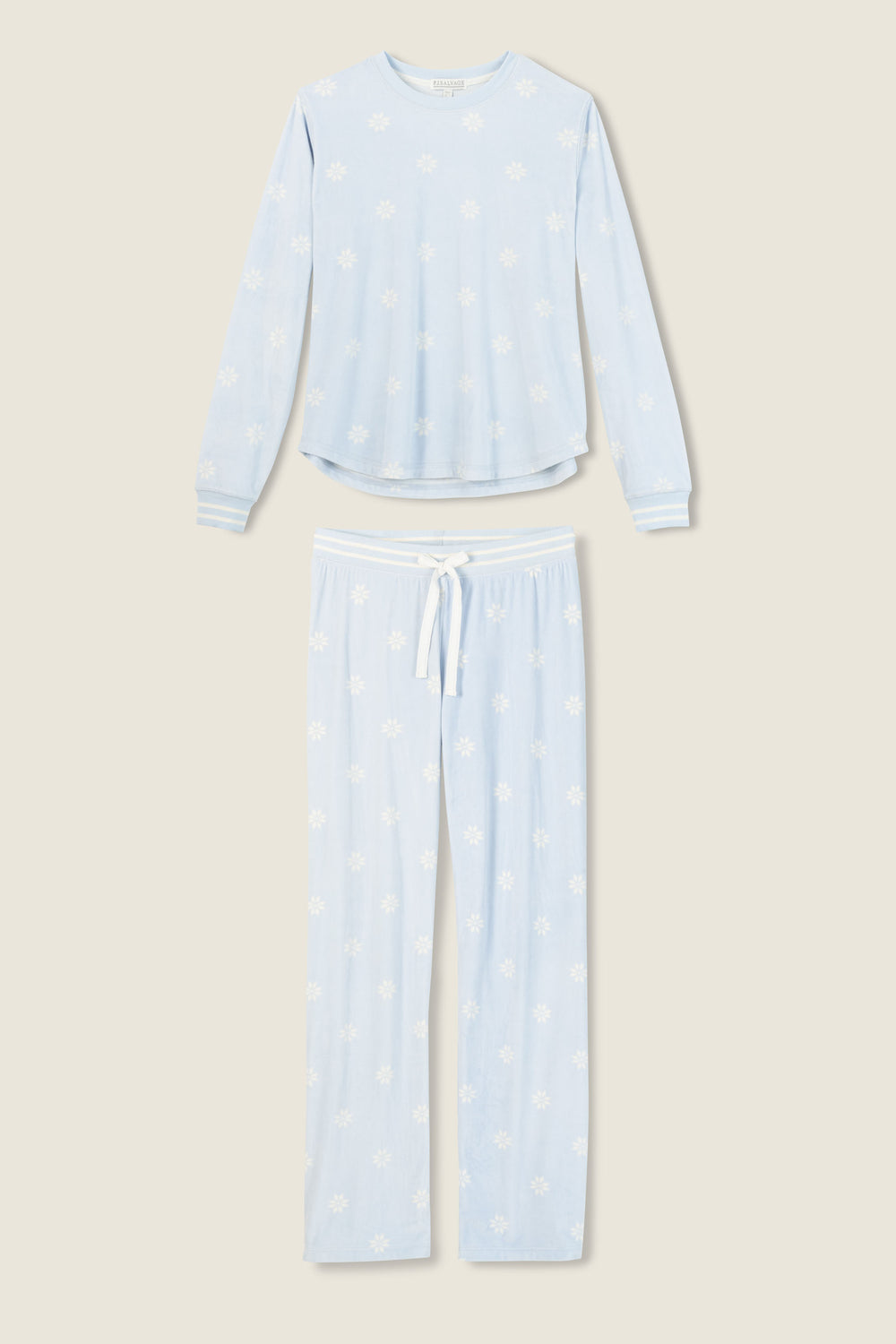 Women's pale blue jammie top and tie waist pant with white snowflake pattern.