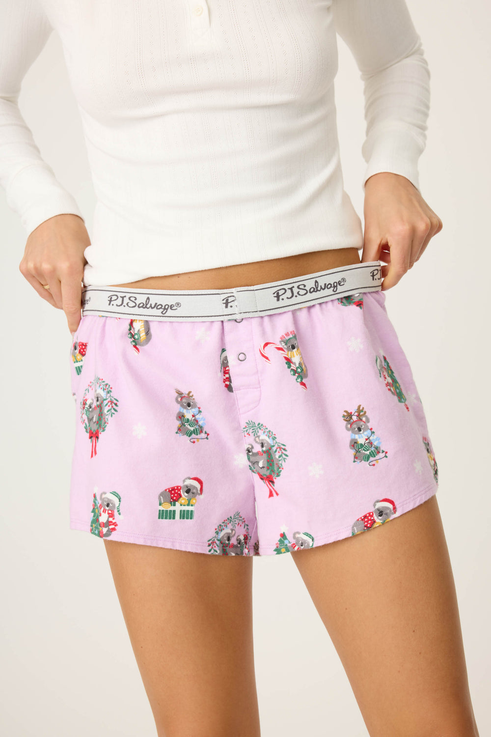 Women's lavender boxer style PJ short with koala pattern.