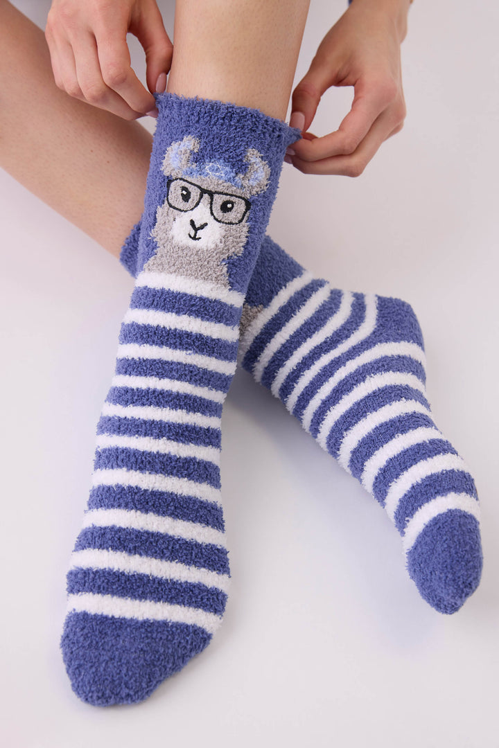 Women's blue and white striped socks with llama detail.