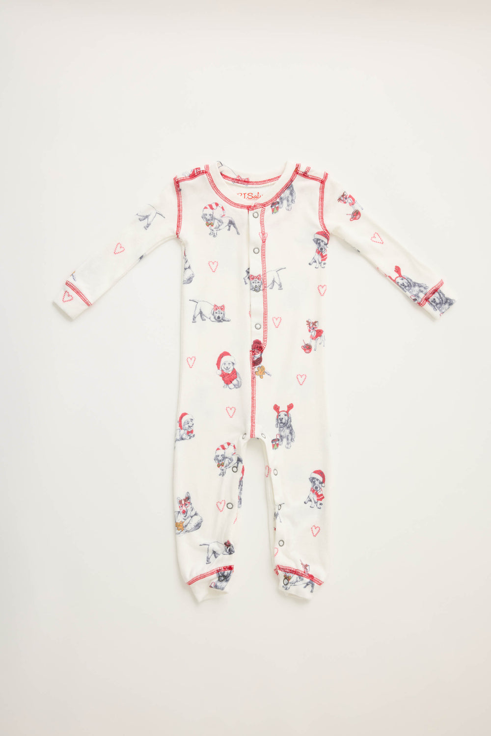 Infant's white romper with holiday dog with red hats pattern.