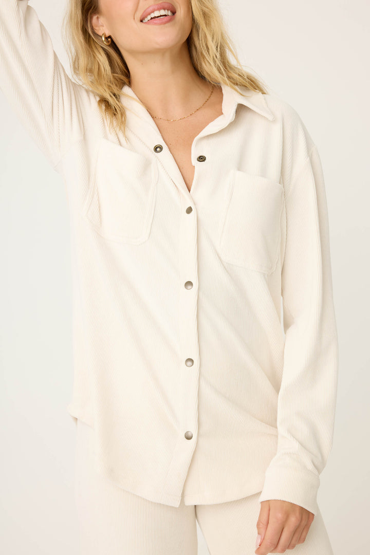 Women's off-white collared button-front knit corduroy long sleeve.