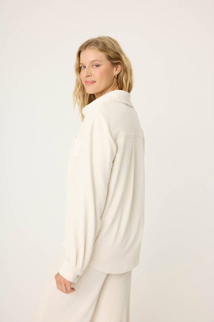 Women's off-white collared button-front knit corduroy long sleeve.