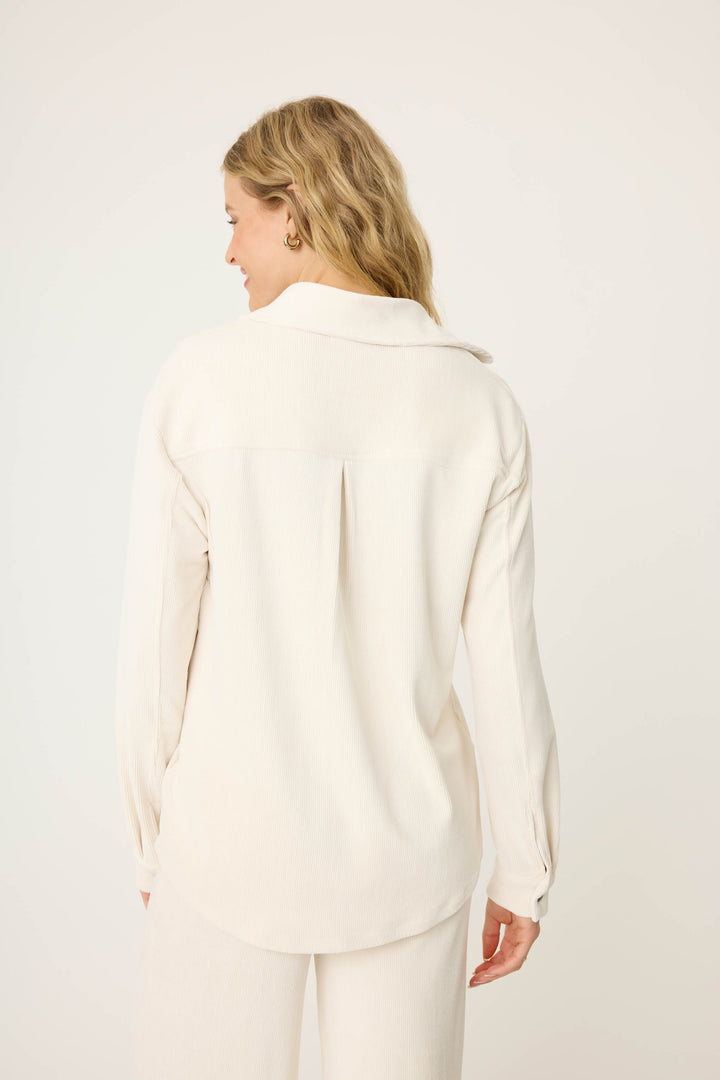 Women's off-white collared button-front knit corduroy long sleeve.