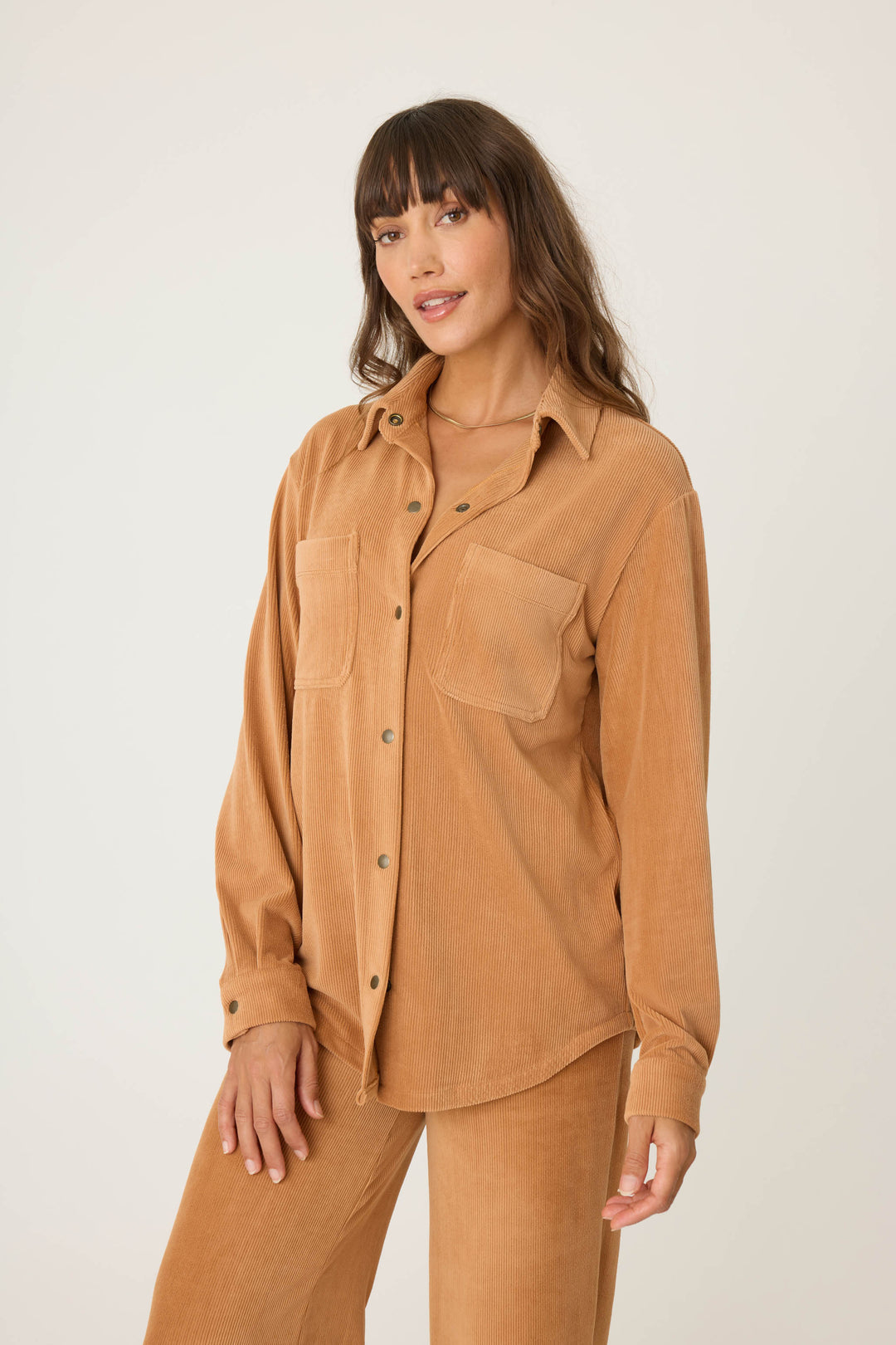 Women's tan collared button-front knit corduroy long sleeve.