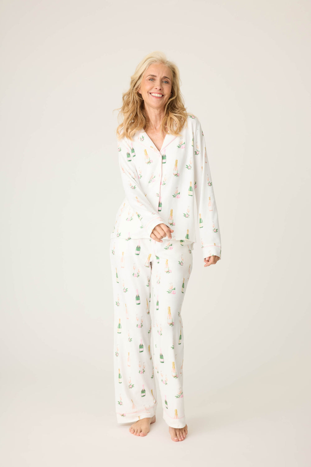 Women's white collared pj top and tie waist pant with champagne pattern.