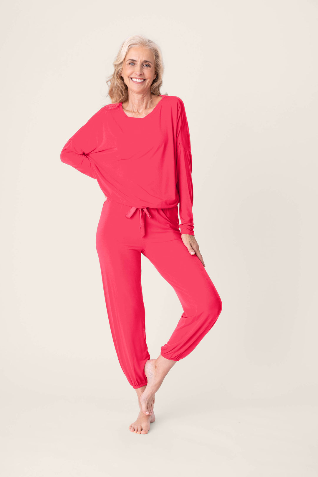 Women's hot pink lounge long sleeve top with banded jogger lounge pants.