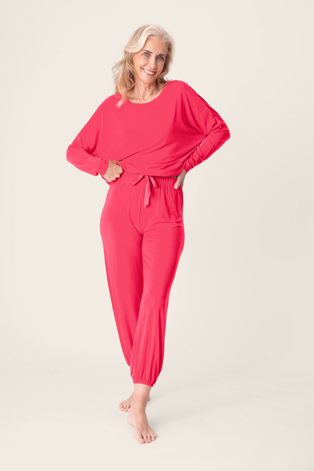 Women's hot pink lounge long sleeve top with banded jogger lounge pants.