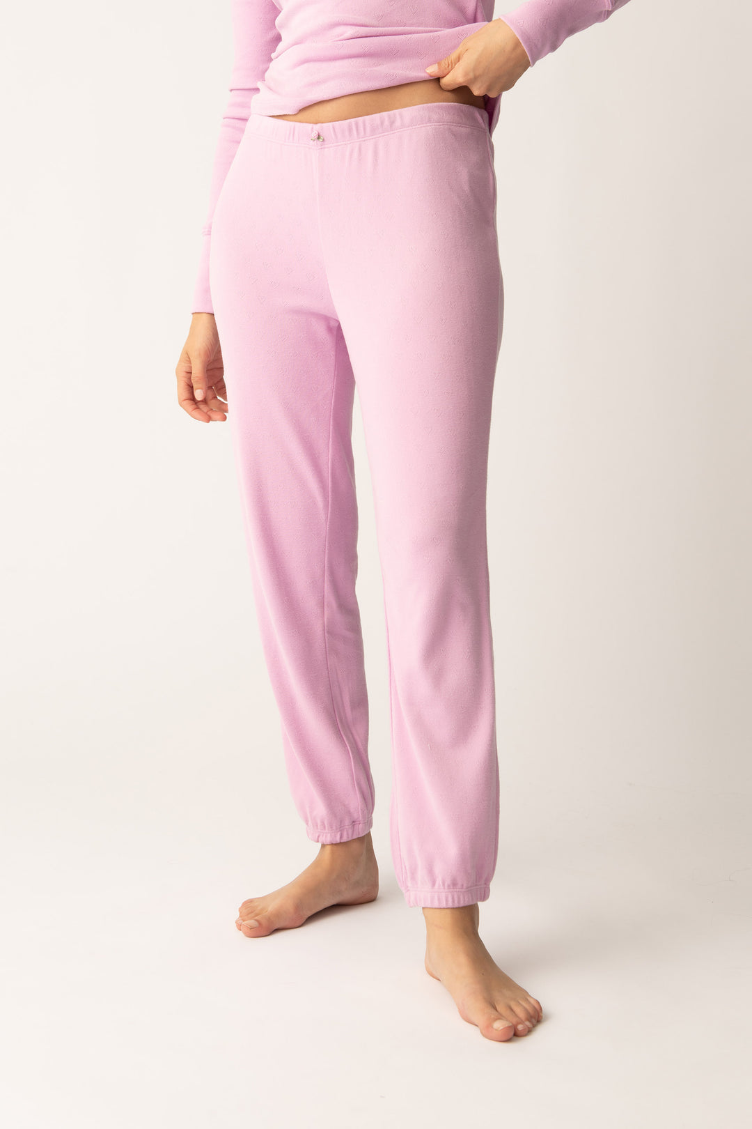 Women's pink banded pj pant with satin rose on waistband.