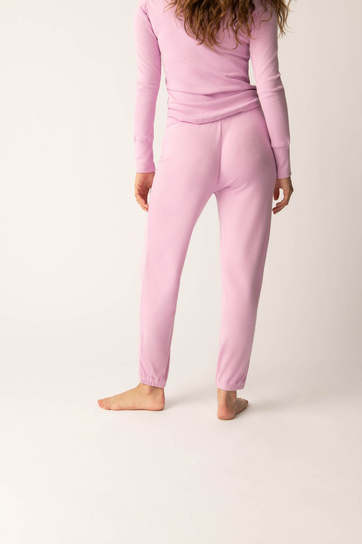 Women's pink banded pj pant with satin rose on waistband.