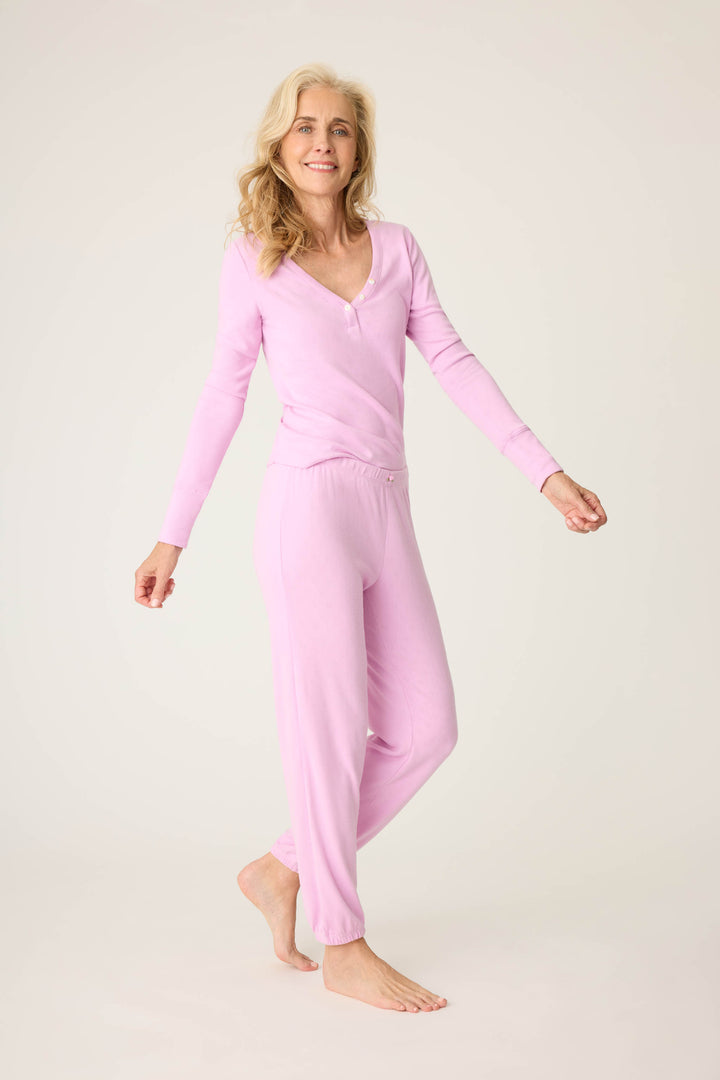 Women's pink jammie v-neck long sleeve and banded pj pant with satin rose on waistband.