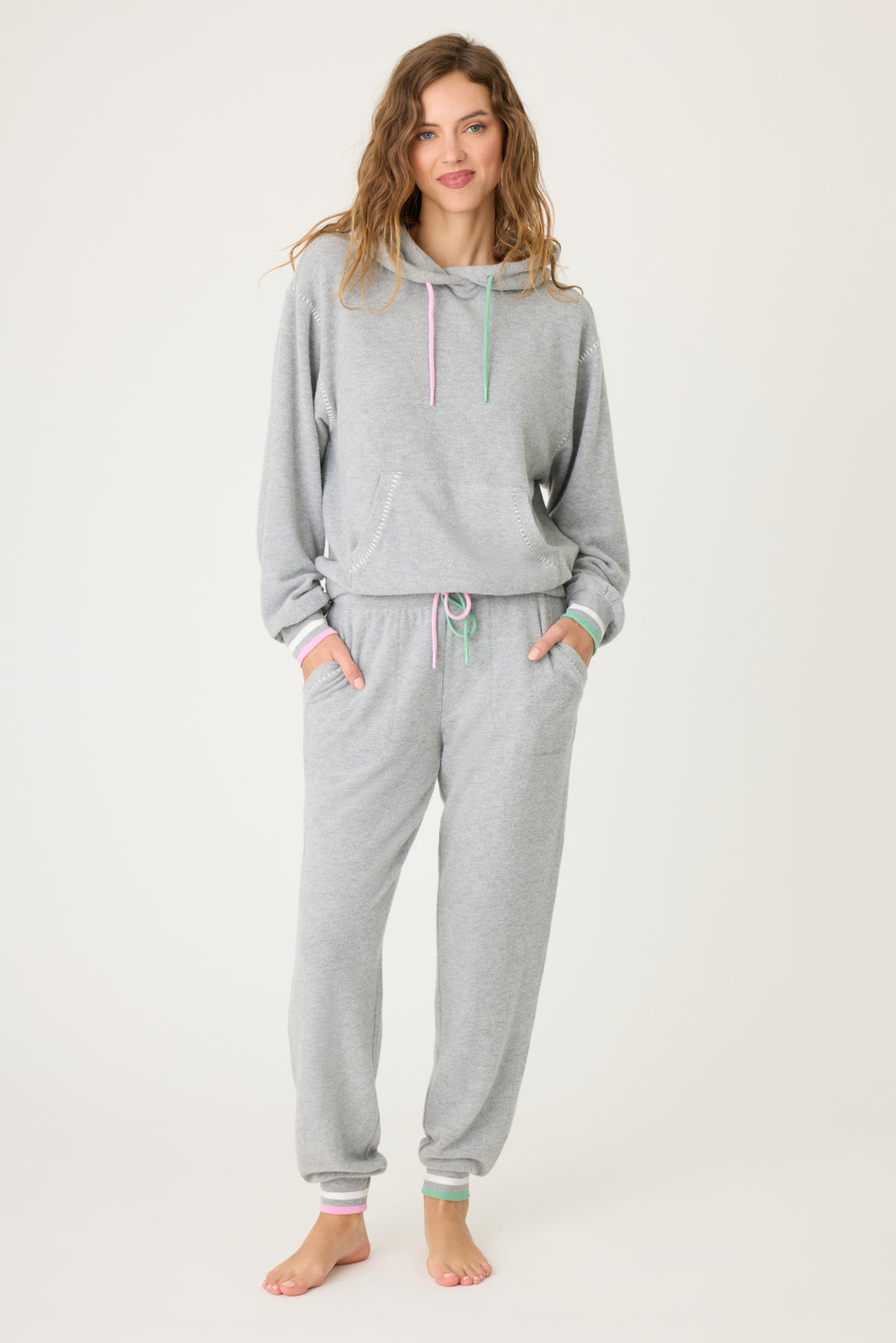 Women's grey pullover hoody & jogger pant with pink & green contrast cords & striped cuffs. Front pocket on hoody & banded pant.