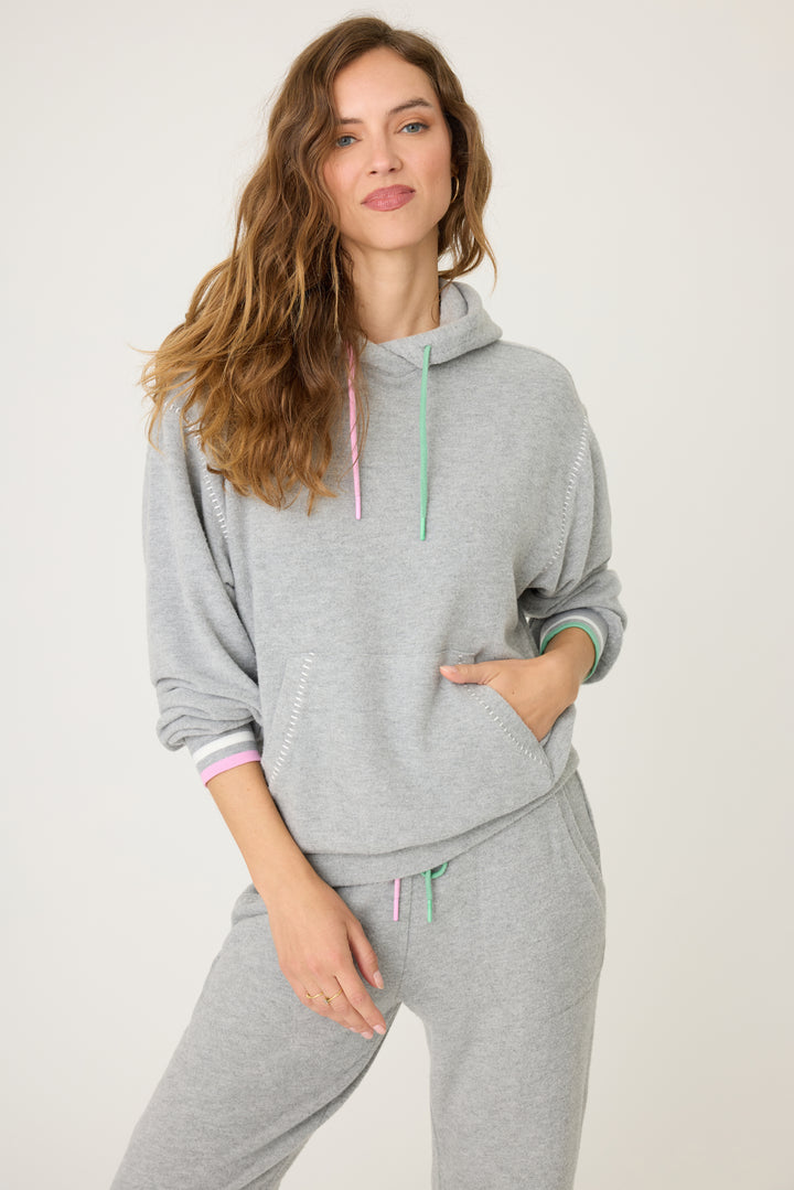 Women's grey pullover hoody & jogger pant with pink & green contrast cords & striped cuffs. Front pocket on hoody & banded pant.