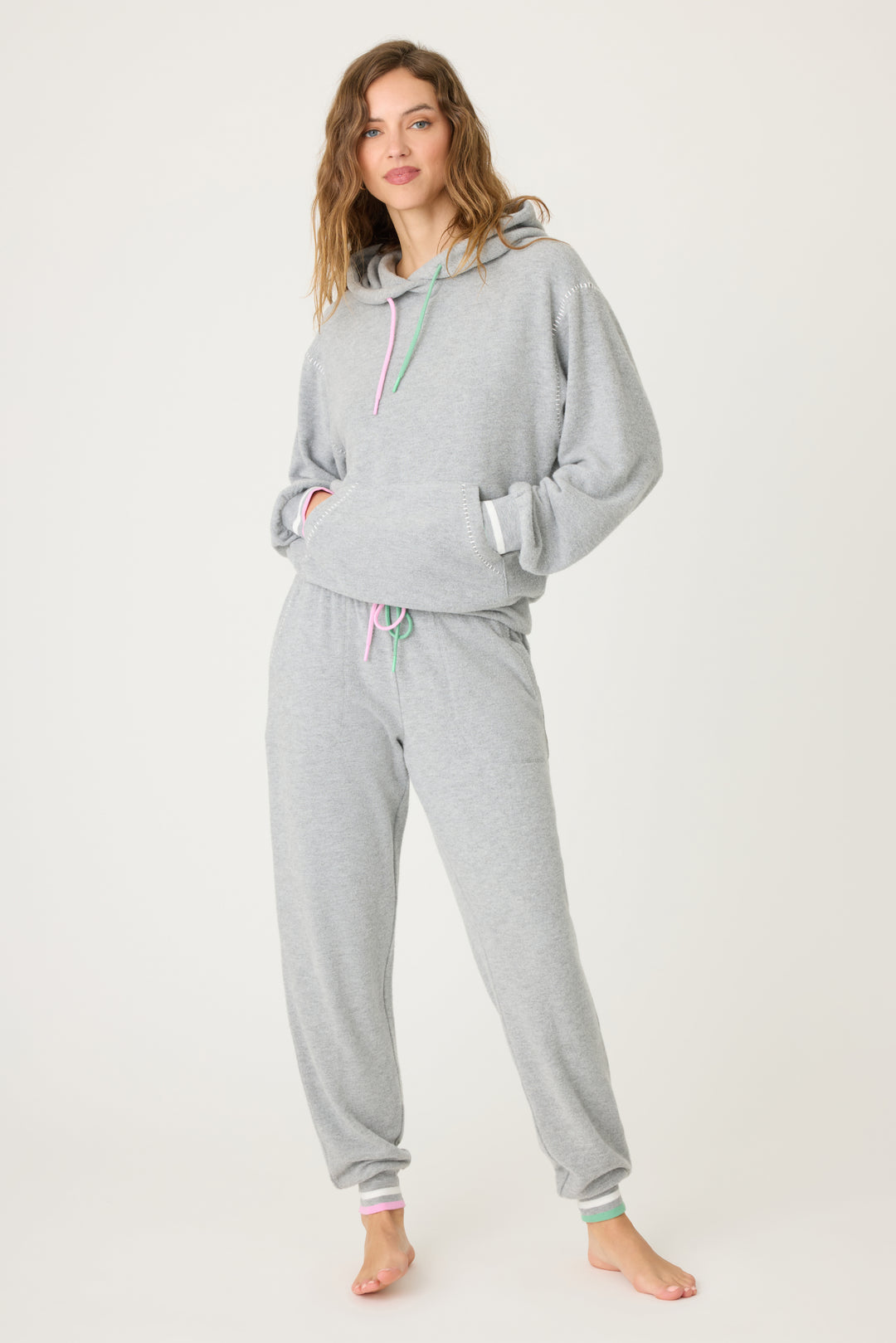 Women's grey pullover hoody & jogger pant with pink & green contrast cords & striped cuffs. Front pocket on hoody & banded pant.