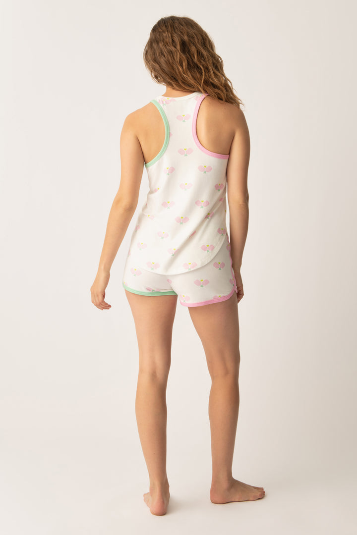 Women's sleep set tank top & short in racket printed peachy in ivory-pink with pink & green contrast binding.