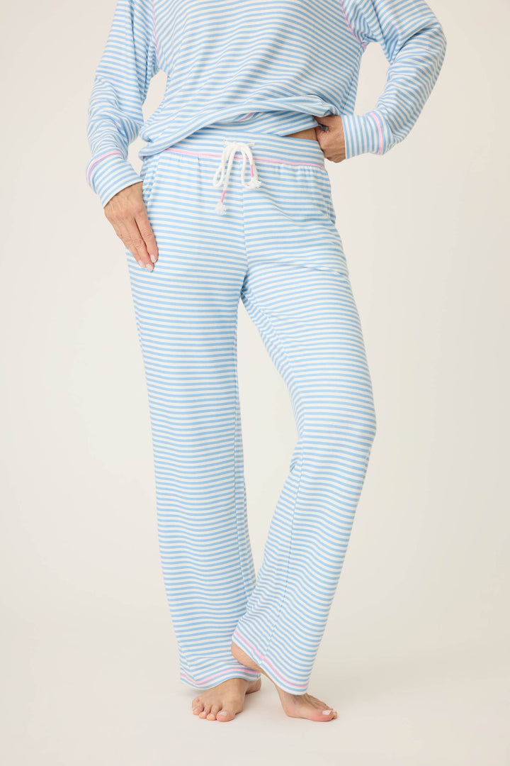 Women's ivory & blue striped open leg lounge pant with pockets. Tie waist band & bright pink stitching accents on ties.