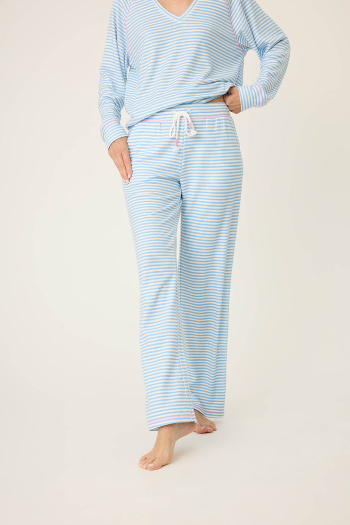 Women's ivory & blue striped open leg lounge pant with pockets. Tie waist band & bright pink stitching accents on ties.