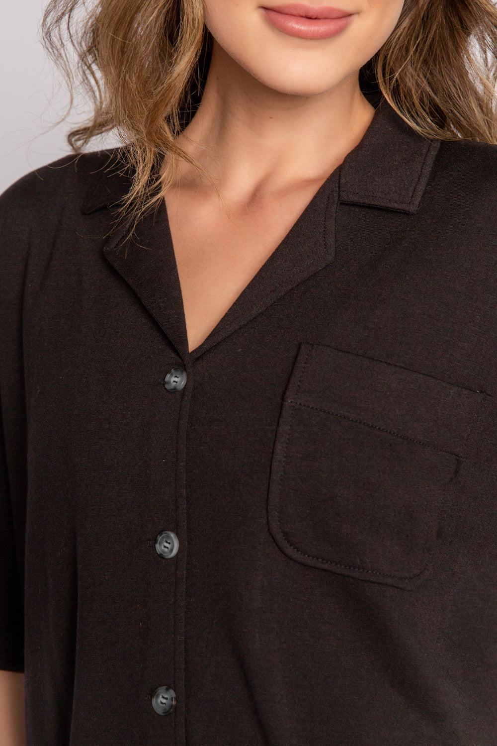 Short sleeve black mini terry button-down pajama shirt with side slit & front pocket. (7122608717924)