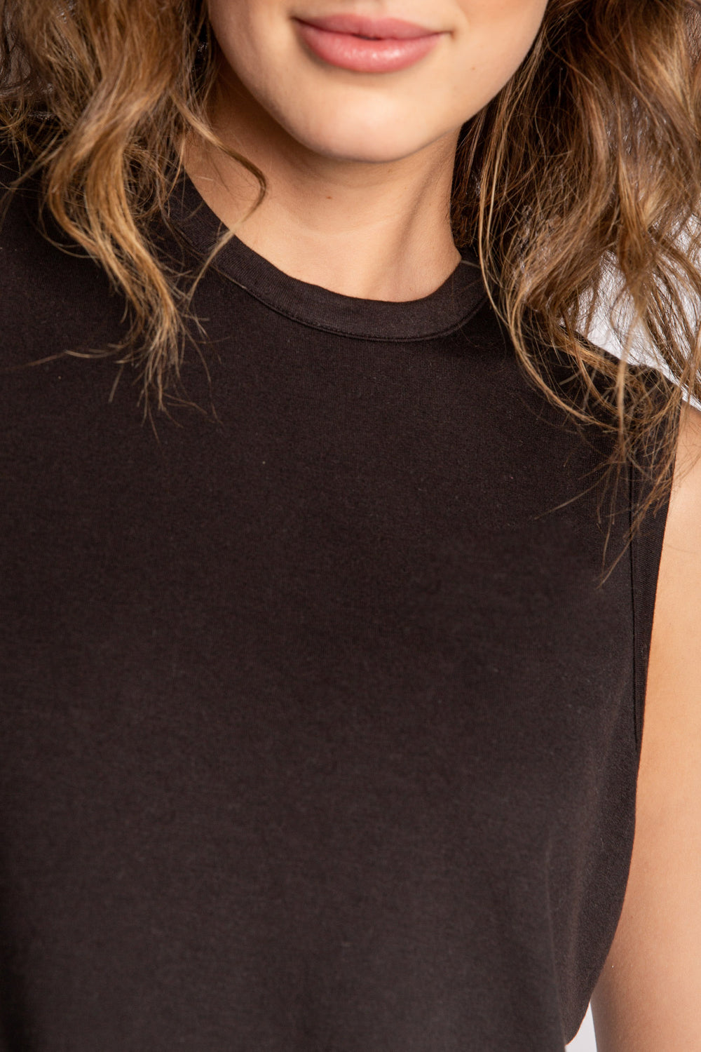 Black crew neck tank top with banded, cinched waist. (7122608816228)