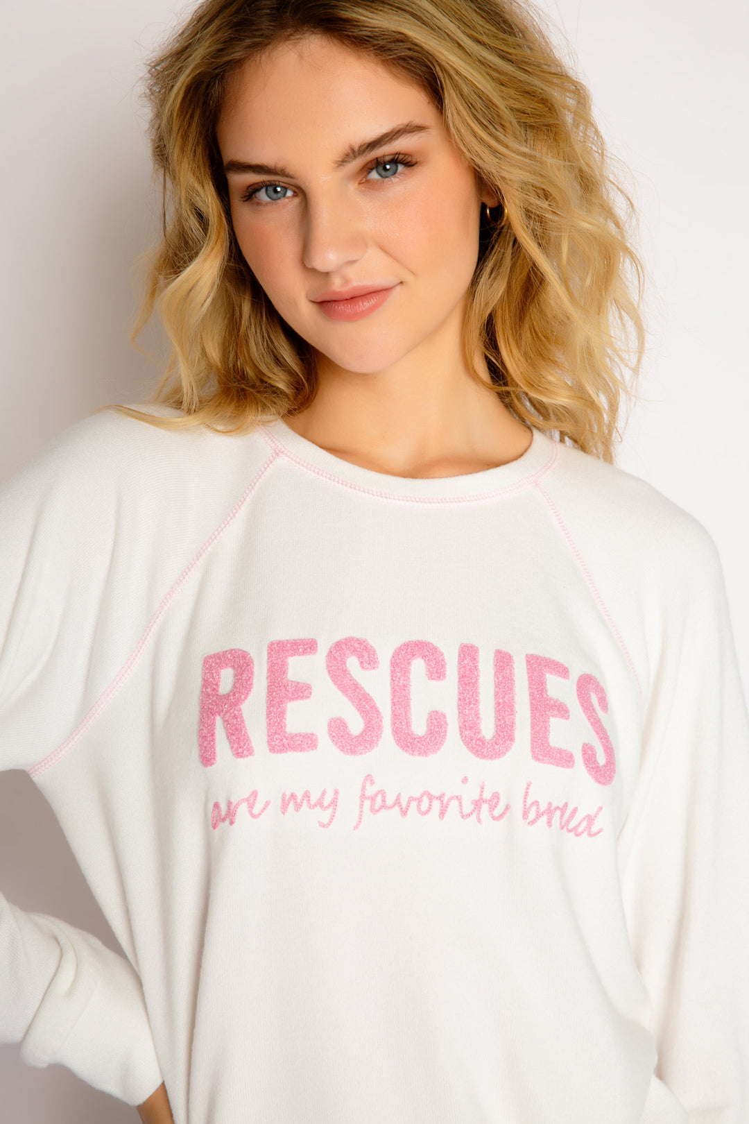Ivory pullover top has a graphic print "Rescues are my favorite breed" (7325668409444)