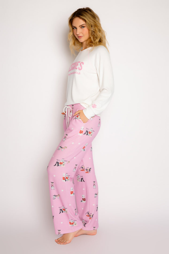 Pink straight leg pj pant in peachy knit with rescue-dog theme print. Front pockets & tie waist. (7325668442212)
