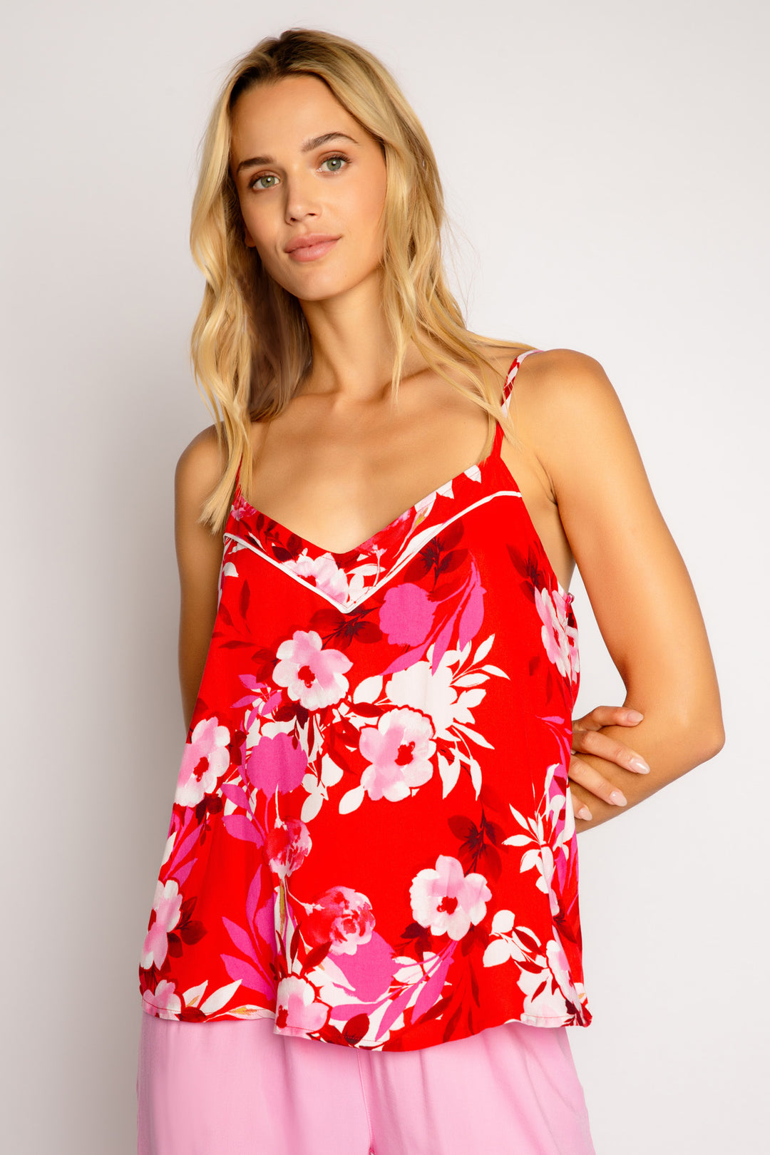 Strappy camisole in red-pink floral-printed woven sateen. Adjustable straps with shelf bra lining. (7325669228644)